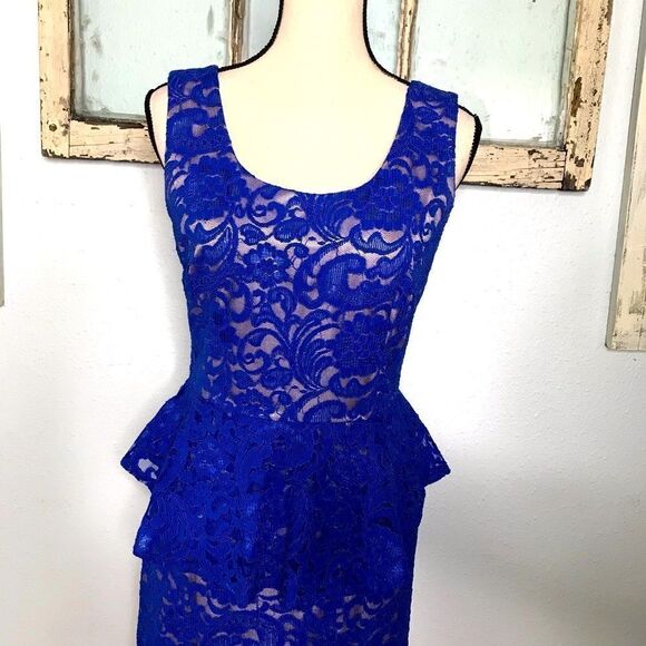 Beautiful Lace Peplum Dress by Explosion - Picture 5 of 13